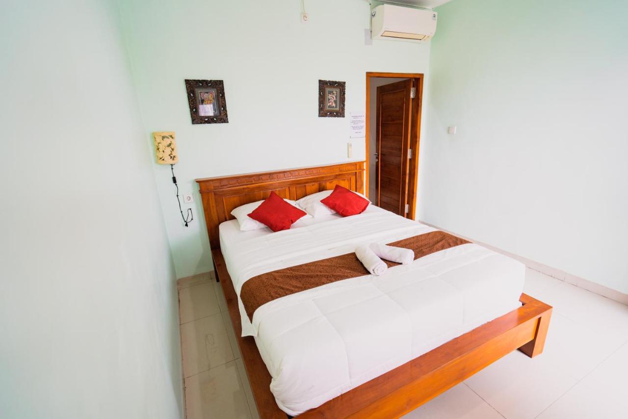 Guesthouse Cempaka Putih Seminyak Esterno foto